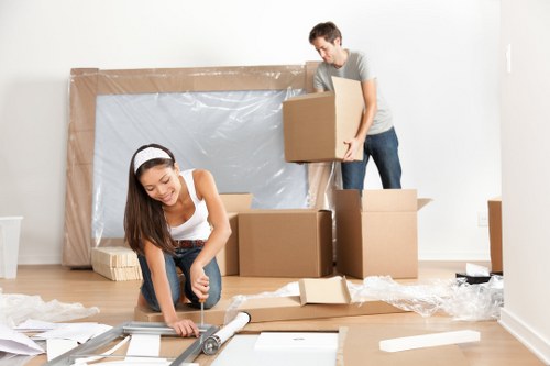 Professional movers handling furniture pick-up