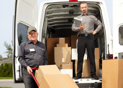 A family preparing for their home move with packed boxes