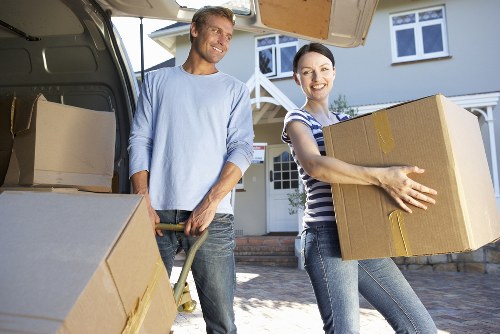 Happy family celebrating a successful move after receiving a competitive quote